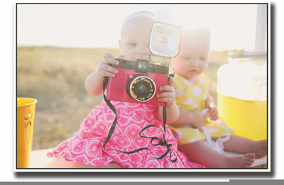 

Posterhouzz Baby with pink camera Fine Art Print(12 inch X 18 inch, Rolled)