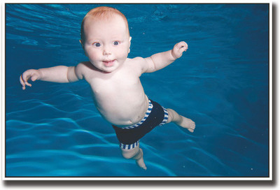 

Baby with beautiful eyes swimming Fine Art Print(12 inch X 18 inch, Rolled)