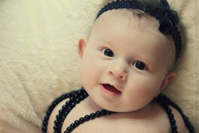 

Posterhouzz Cute Baby With Beads Photographic Paper(12 inch X 18 inch, Rolled)