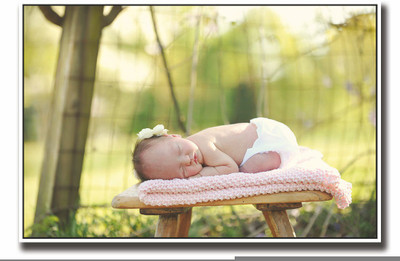 

Posterhouzz Cute baby sleeping on wooden stool Fine Art Print(12 inch X 18 inch, Rolled)