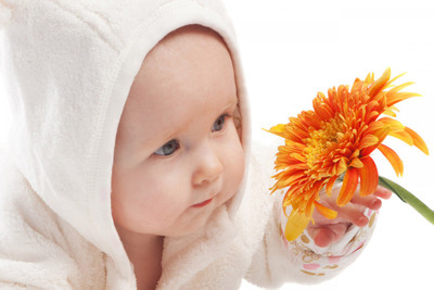 Posterhouzz Baby with flower Poster Paper Print(12 inch X 18 inch, Rolled)