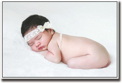 

Cute baby with white hair band Fine Art Print(12 inch X 18 inch, Rolled)