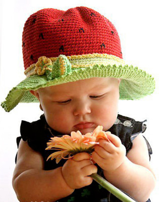 

Posterhouzz Baby'S - Cute Baby Playing With Flower Paper Print(18 inch X 12 inch, Rolled)