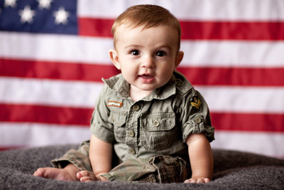 

Child's love - Military Baby Paper Print(12 inch X 18 inch, Streched)