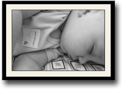 

Baby sleeping on bed Fine Art Print(10 inch X 14 inch, Framed)