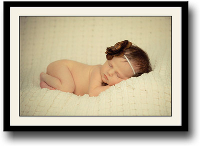 

Baby with brown bow sleeping Fine Art Print(10 inch X 14 inch, Framed)