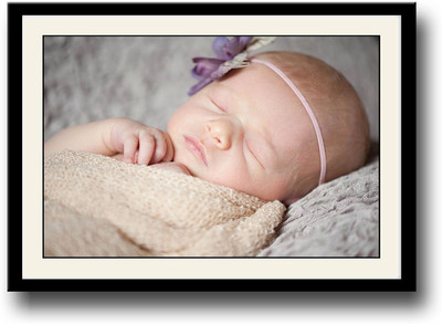 

Cute baby wrapped in Yellow sleeping Fine Art Print(10 inch X 14 inch, Framed)