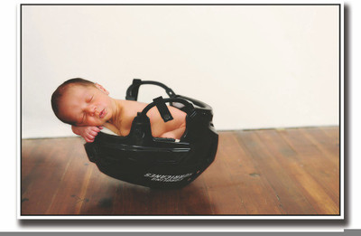 

Posterhouzz Cute little baby sleeping in helmet Fine Art Print(12 inch X 18 inch, Rolled)