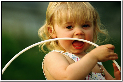 

Posterhouzz Baby Girl Playing With Hoop Poster Paper Print(12 inch X 18 inch, Rolled)