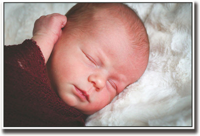 

Baby wrapped in maroon Fine Art Print(12 inch X 18 inch, Rolled)
