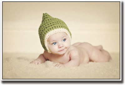 

Adorable baby with green hat Fine Art Print(12 inch X 18 inch, Rolled)