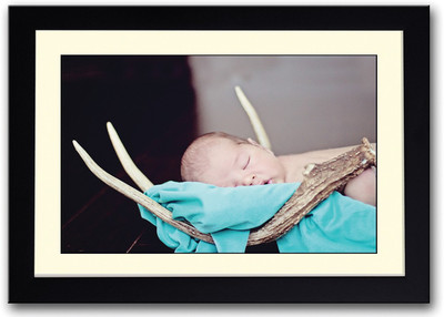 

Baby Sleeping In Wooden Horns Fine Art Print(14 inch X 20 inch, Framed)