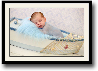 

Amazing cute baby on small boat Fine Art Print(10 inch X 14 inch, Framed)