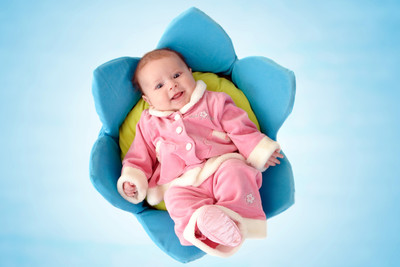 

Posterhouzz Baby's Love - Smiling Baby in Blue Cotton Flower Paper Print(12 inch X 18 inch, Rolled)