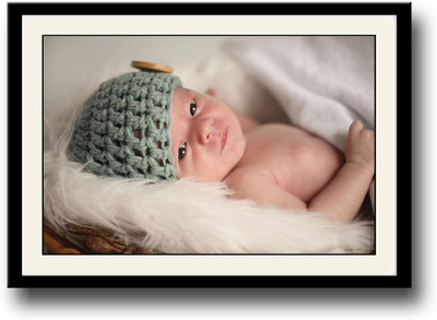 

Baby with button cap looking Fine Art Print(10 inch X 14 inch, Framed)