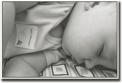 

Baby sleeping on bed Fine Art Print(12 inch X 18 inch, Rolled)