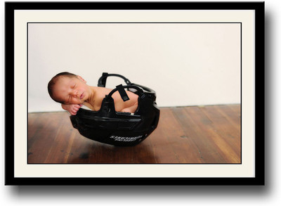 

Cute little baby sleeping in helmet Fine Art Print(10 inch X 14 inch, Framed)