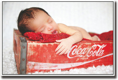 

Baby sleeping in cold drink crate Fine Art Print(12 inch X 18 inch, Rolled)