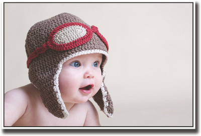 

Adorable baby with brown pilot cap Fine Art Print(12 inch X 18 inch, Rolled)