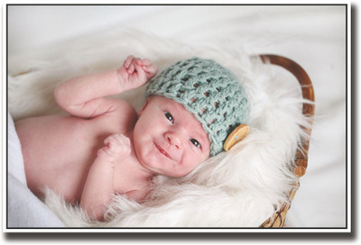 

Baby with button cap in basket Fine Art Print(12 inch X 18 inch, Rolled)