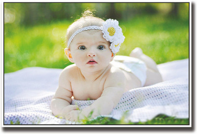 

Baby with flower on head Fine Art Print(12 inch X 18 inch, Rolled)