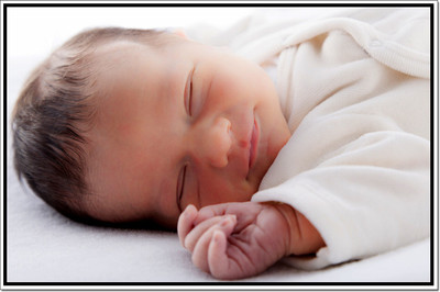 

Posterhouzz Baby Sleeping in Smile Poster Paper Print(12 inch X 18 inch, Rolled)