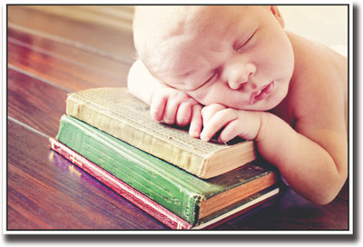 

Baby sleeping on books Fine Art Print(12 inch X 18 inch, Rolled)