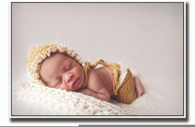 

Posterhouzz Cute newborn baby in brown Fine Art Print(12 inch X 18 inch, Rolled)