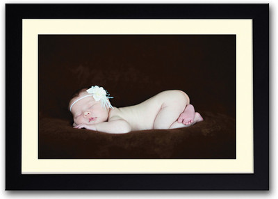 

Cute Baby Sleeping On Brown Fine Art Print(14 inch X 20 inch, Framed)