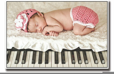 

Posterhouzz Baby sleeping on piano Fine Art Print(12 inch X 18 inch, Rolled)