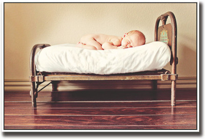 

Baby on a small bed Fine Art Print(12 inch X 18 inch, Rolled)