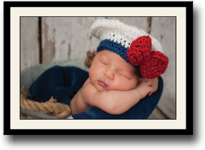 

New Born baby with red & white cap Fine Art Print(10 inch X 14 inch, Framed)