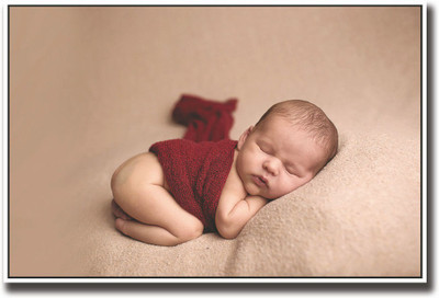 

Very cute baby wrapped in red Fine Art Print(12 inch X 18 inch, Rolled)