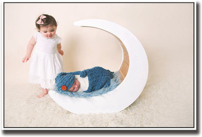 

Baby sleeping in a moon bed Fine Art Print(12 inch X 18 inch, Rolled)