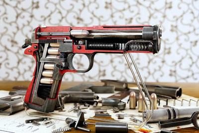 

Oshi - Pistol and Bullet on Wall Paper Print(12 inch X 18 inch, Stretched)