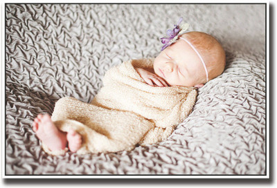

Cute baby wrapped in Yellow Fine Art Print(12 inch X 18 inch, Rolled)