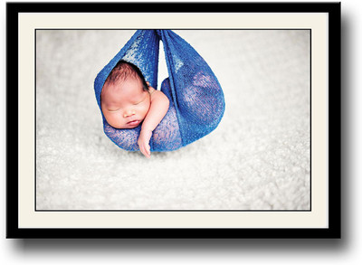 

Baby sleeping in a blue swing Fine Art Print(10 inch X 14 inch, Framed)