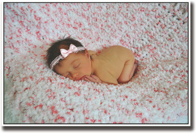 

Baby with pink bow sleeping Fine Art Print(12 inch X 18 inch, Rolled)