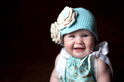 

Posterhouzz Baby's Love - Cute Little Baby Girl in Blue Paper Print(12 inch X 18 inch, Rolled)