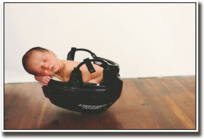 

Cute little baby sleeping in helmet Fine Art Print(12 inch X 18 inch, Rolled)