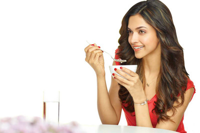 

Deepika Padukon in Café Poster Paper Print(12 inch X 18 inch, Rolled)