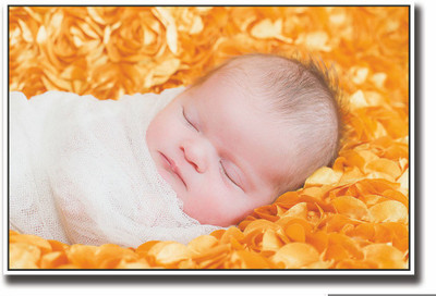 

Posterhouzz Cute baby sleeping on orange image Fine Art Print(12 inch X 18 inch, Rolled)