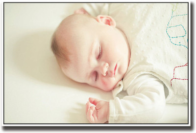 

Newborn in White Fine Art Print(12 inch X 18 inch, Rolled)