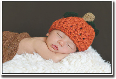 

Baby in a cute orange hat Fine Art Print(12 inch X 18 inch, Rolled)