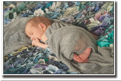 

Posterhouzz Baby wrapped in grey Fine Art Print(12 inch X 18 inch, Rolled)