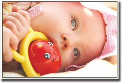 

Baby playing with a toy Fine Art Print(12 inch X 18 inch, Rolled)