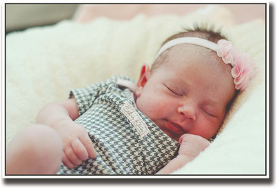 Baby girl with bow smiling Fine Art Print(12 inch X 18 inch, Rolled)