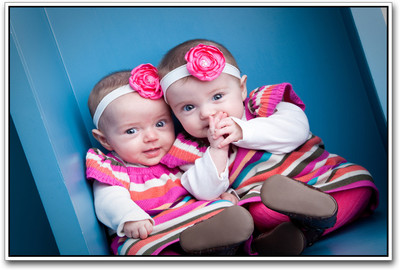 

Two cute baby girls with flowers Paper Print(12 inch X 18 inch)
