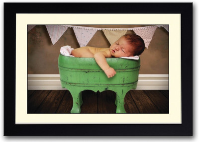 

Baby Sleeping On Green Stool Fine Art Print(14 inch X 20 inch, Framed)