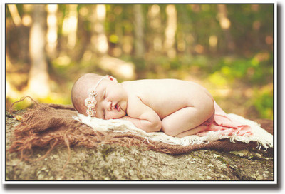 

Cute baby sleeping on rock Fine Art Print(12 inch X 18 inch, Rolled)